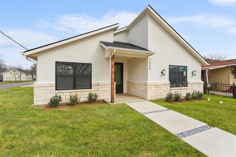 Front exterior of a new home in , Dallas, TX, highlighting curb appeal (Image 22).