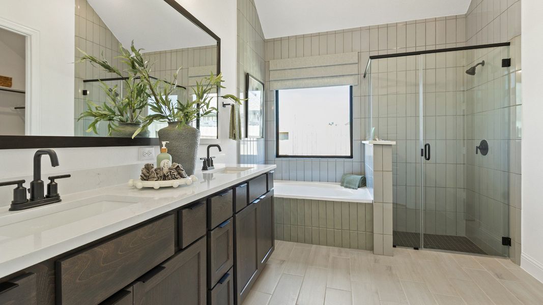 Representative furnished interior of a home built from the Oleander by Brightland Homes in Sunterra, Katy (Image 12).