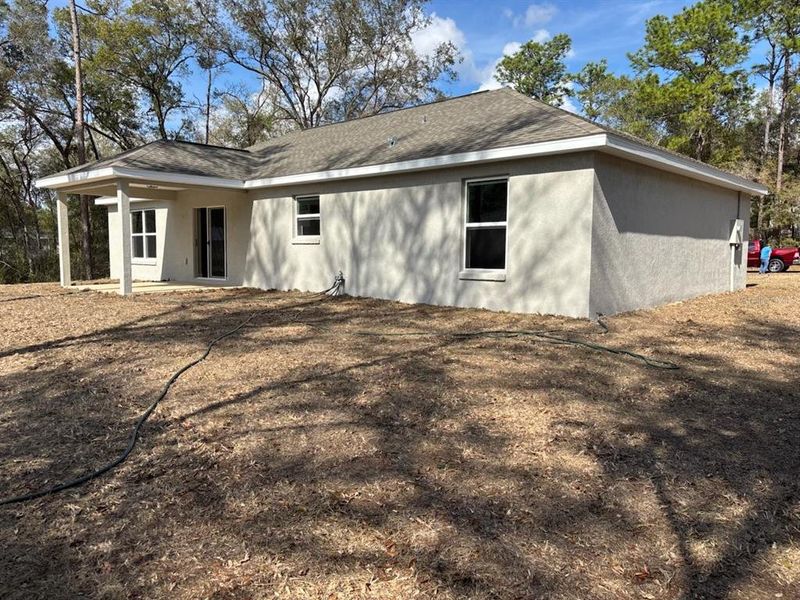 Exterior details and patio area of a home in , Citrus Springs (Image 3).
