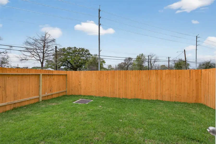 Expansive fenced yard with open green space and plenty of room to create your ideal outdoor setting. Expansive fenced yard with open green space and plenty of room to create your ideal outdoor setting.