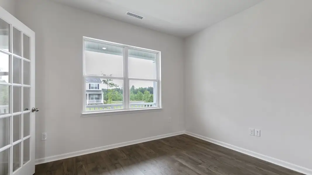 Spacious, unfurnished interior of a new home in Villa Grande, Winterville (Image 14).