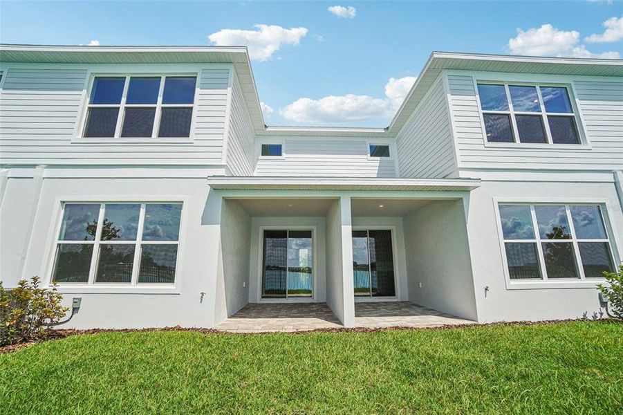 Front exterior of a new home in Isla Mirada, San Antonio, FL, highlighting curb appeal (Image 25).