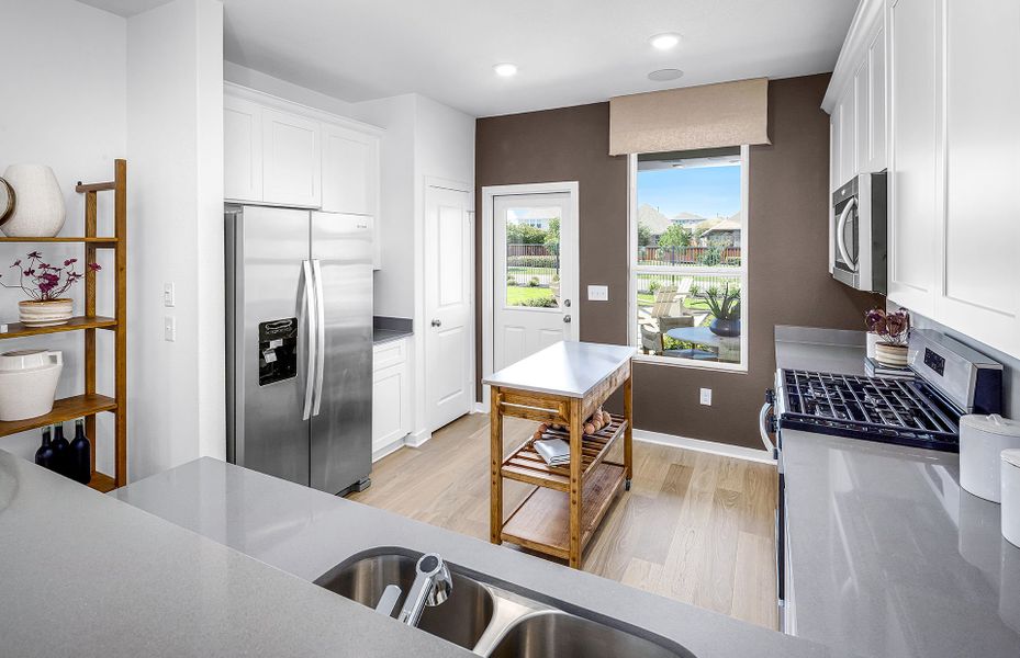 Furnished interior view inside a new home in Sunfield, Buda (Image 5).