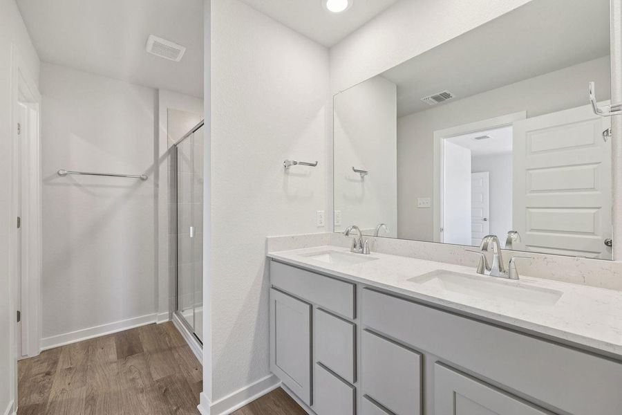 Furnished interior view inside a new home in The Hollows at Avery Centre, Round Rock (Image 11).