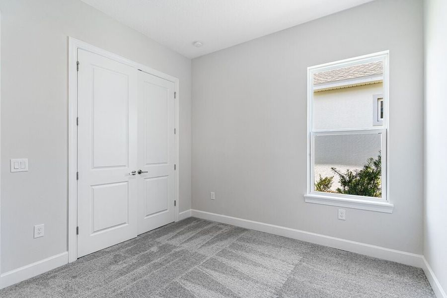 Representative unfurnished interior of a home built from the Letizia by Taylor Morrison in Esplanade at Center Lake Ranch, St. Cloud (Image 27).