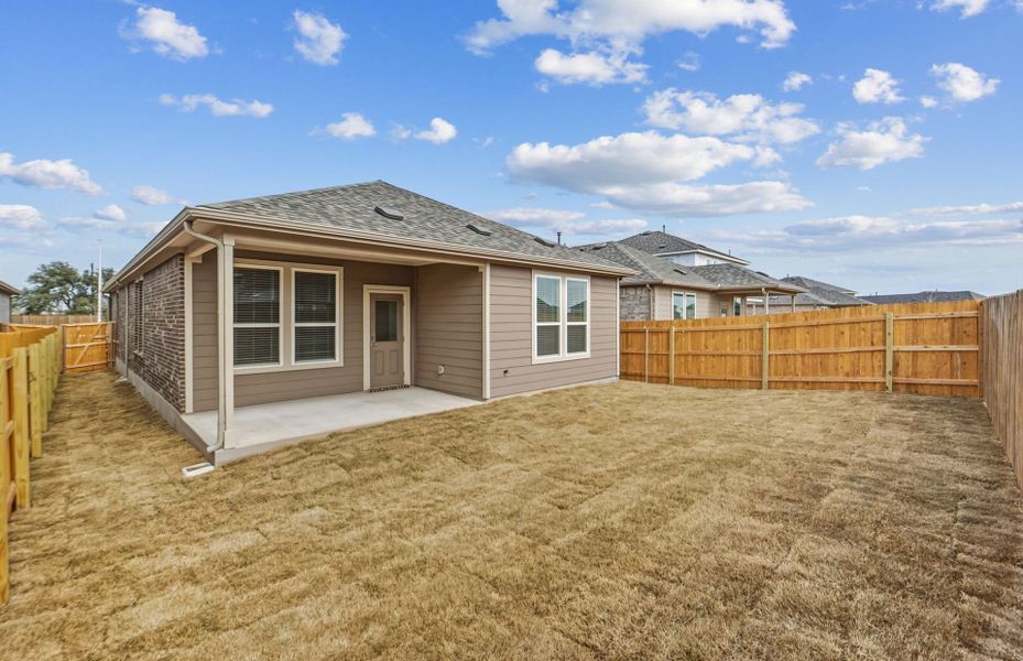 Exterior details and patio area of a home in Crosswinds, Kyle (Image 3).
