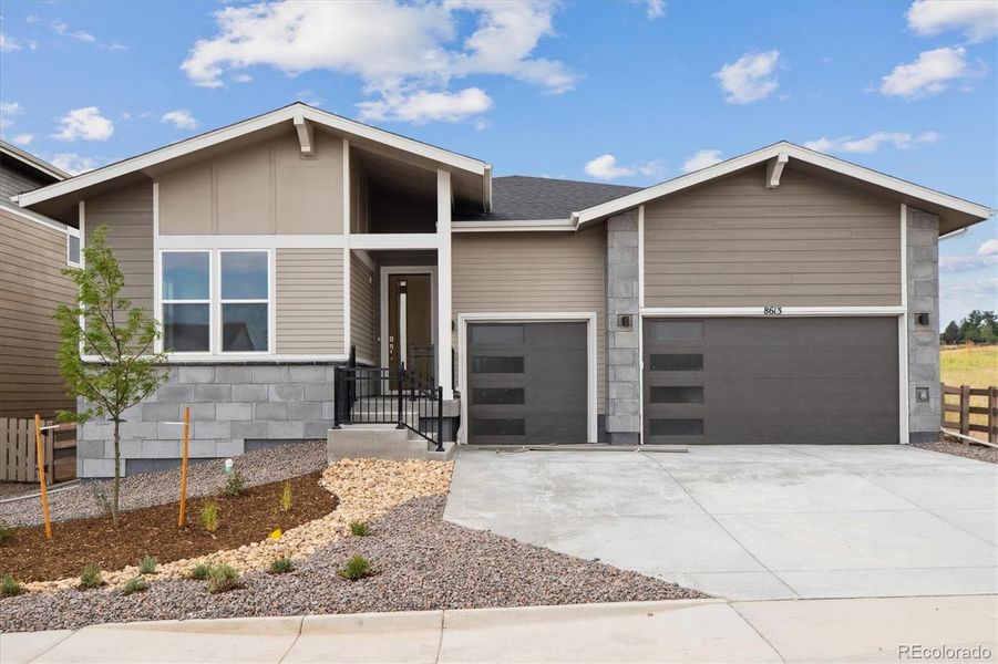 Front exterior of a new home in , Littleton, CO, highlighting curb appeal (Image 1).