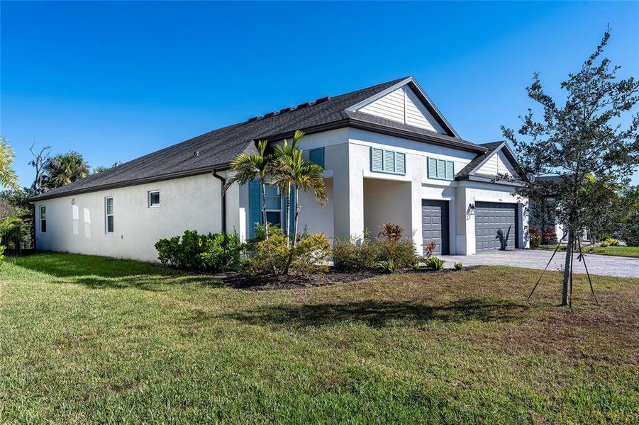 Front exterior of a new home in , Palmetto, FL, highlighting curb appeal (Image 29).