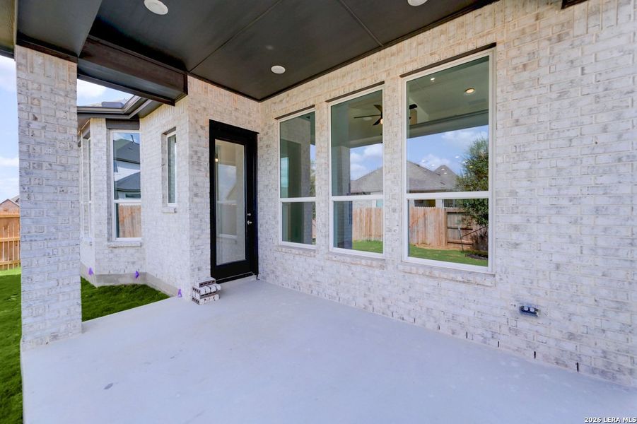 Exterior details and patio area of a home in Prominence, San Antonio (Image 16).
