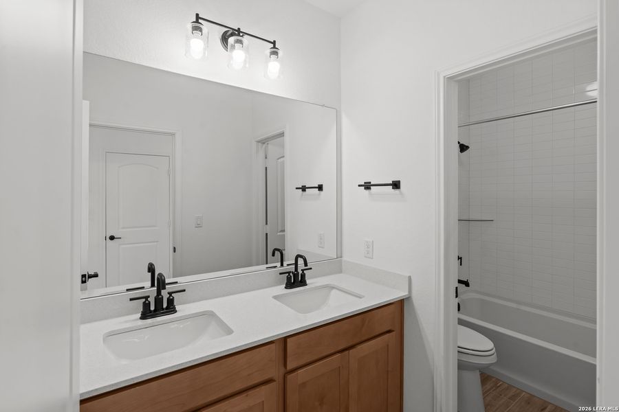 Furnished interior view inside a new home in Bison Ridge, San Antonio (Image 4).