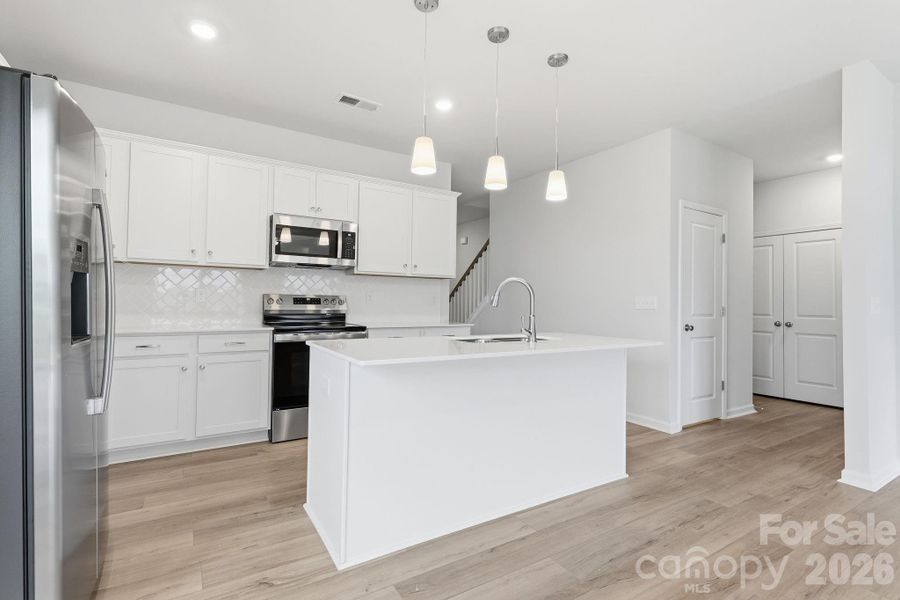 Furnished interior view inside a new home in Piper Creek, Newton (Image 8).