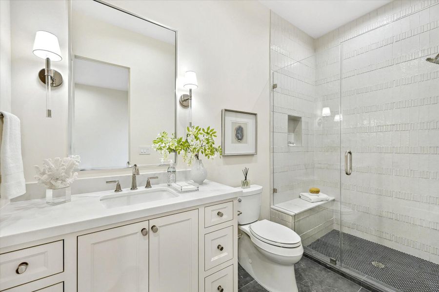 [Secondary Bath] One of FIVE secondary baths. All are well-appointed bathrooms with ample counter space and storage.