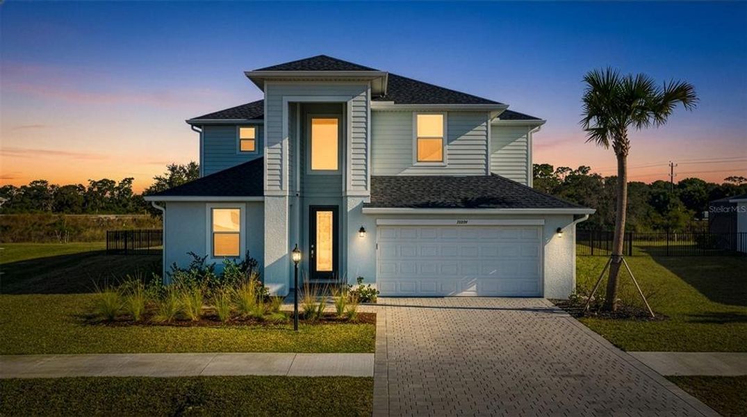 Front exterior of a new home in , North Fort Myers, FL, highlighting curb appeal (Image 2). Front exterior of a new home in , North Fort Myers, FL, highlighting curb appeal (Image 2).
