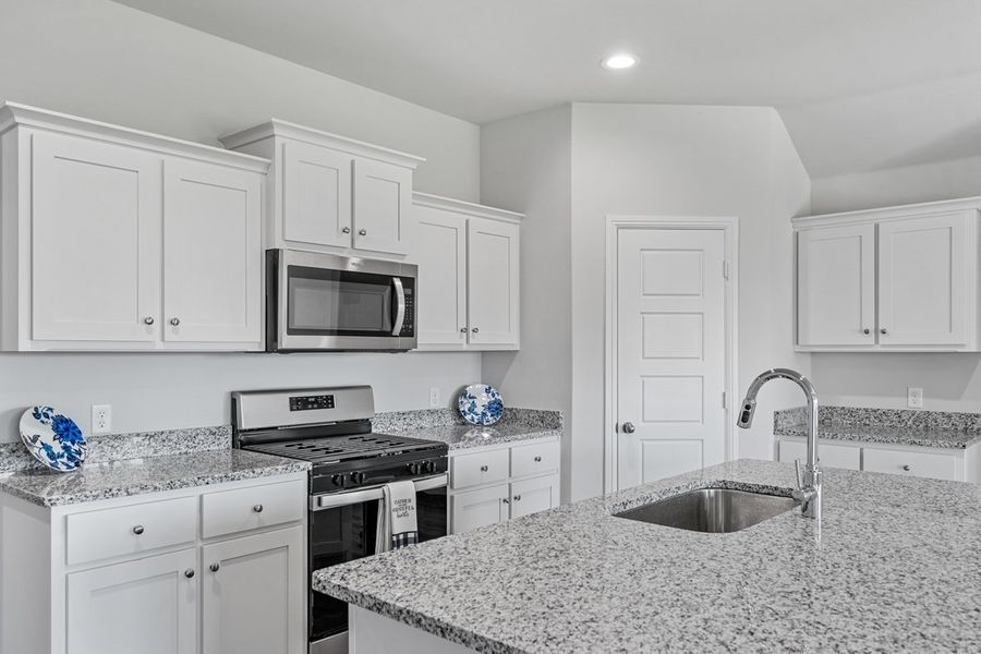 Representative furnished interior of a home built from the TEXAS CALI by D.R. Horton in Faculty Row, Abilene (Image 11).