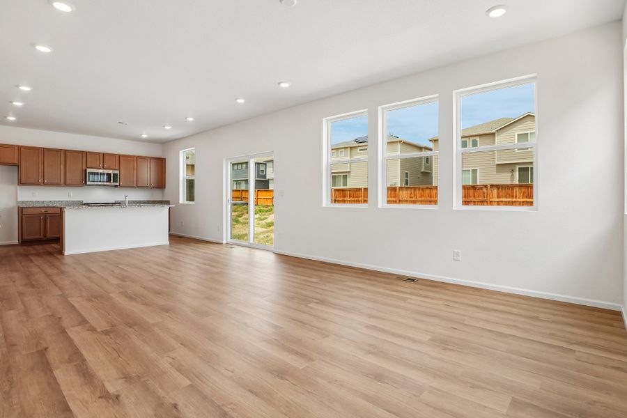Spacious, unfurnished interior of a new home in The Cottages Collection at Ridgeline Vista, Brighton (Image 13).