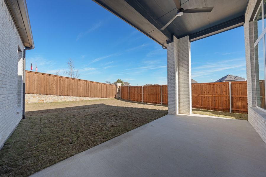Exterior details and patio area of a home in Quail Hollow, Rockwall (Image 3).