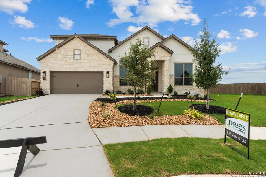 Front exterior of a new home in Legacy at Lake Dunlap, New Braunfels, TX, highlighting curb appeal (Image 1).