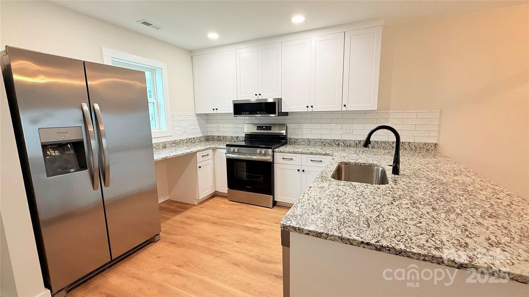 Furnished interior view inside a new home in , Morganton (Image 7). Furnished interior view inside a new home in , Morganton (Image 7).