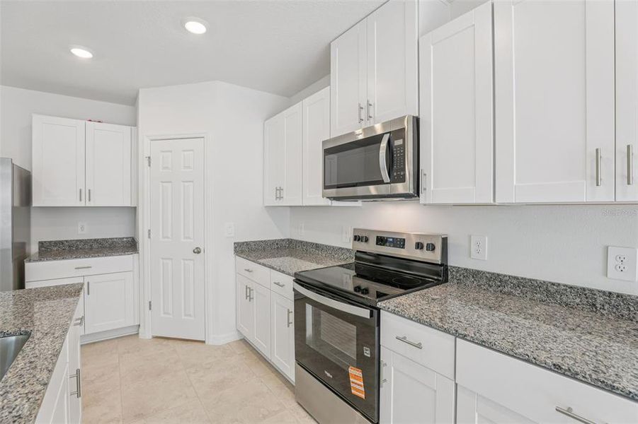 Furnished interior view inside a new home in Deer Run at Crosswinds, Davenport (Image 29).