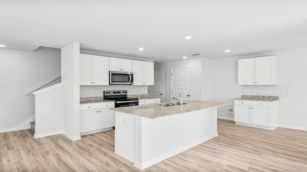 Representative furnished interior of a home built from the The Aisle by D.R. Horton in Titus Park, Panama City (Image 7).