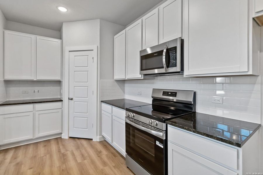 Furnished interior view inside a new home in Red Hawk Landing, San Antonio (Image 5).