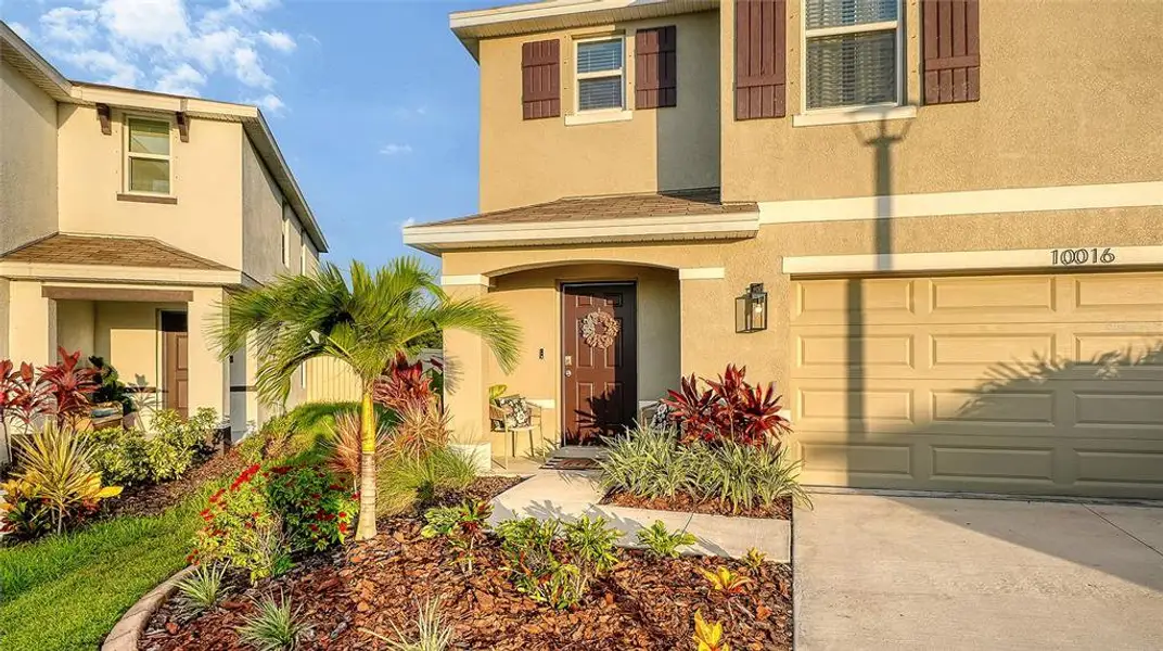 Exterior details and patio area of a home in Bella Lago, Parrish (Image 3).