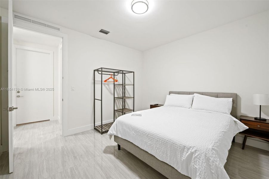 Furnished interior view inside a new home in , Miami Springs (Image 10).