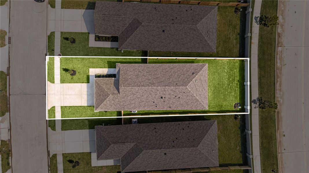 Amazing aerial shot of this gorgeous Meritage home situated on a spacious lot on a quiet street in the sought after community of Sundance Cove zoned to Crosby ISD. Lush landscaping, well manicured front lawn and a wonderful back patio perfect to set up, an outdoor sitting area with no back neighbors.