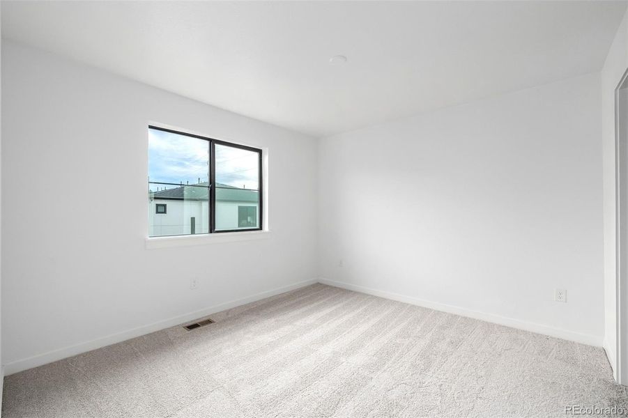 Spacious, unfurnished interior of a new home in The Hub at Virginia Village, Denver (Image 17).