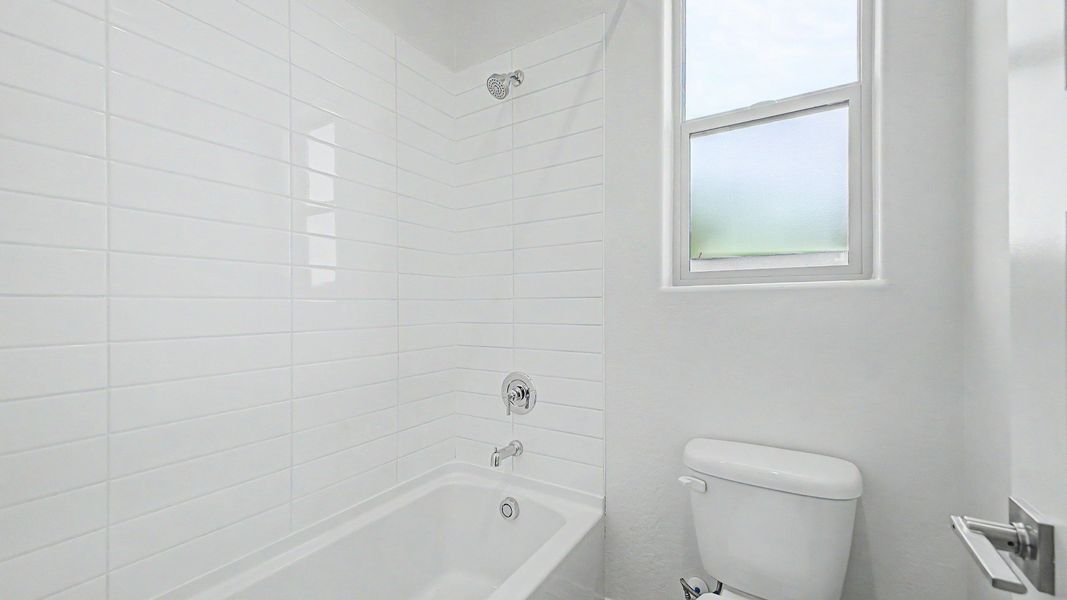 Representative furnished interior of a home built from the Montoro by DRB Homes in Windrose, Waddell (Image 21).
