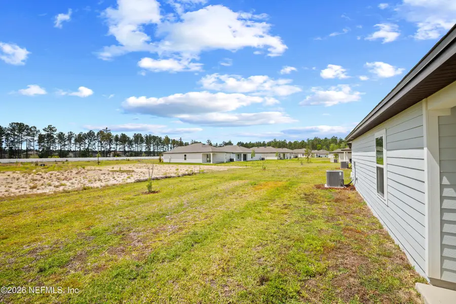 Exterior details and patio area of a home in Westport Landing, Jacksonville (Image 4).