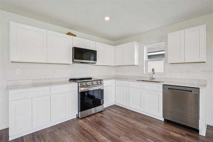 Furnished interior view inside a new home in Eagle Hammock, Eagle Lake (Image 8).