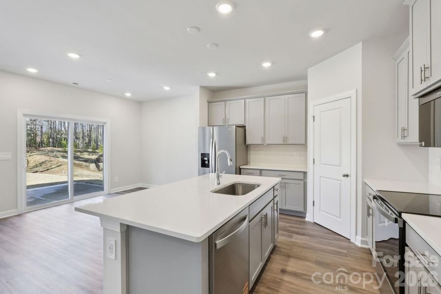 Photo is not of the actual home, but is an inspirational photo of builder’s model home and may depict options, furnishings, and/or decorator features that are not included Photo is not of the actual home, but is an inspirational photo of builder’s model home and may depict options, furnishings, and/or decorator features that are not included