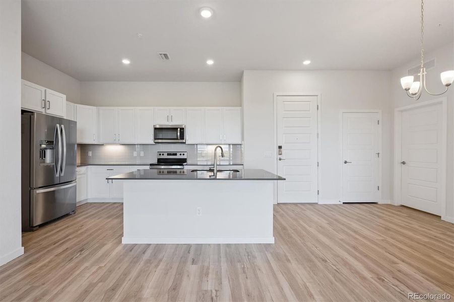Furnished interior view inside a new home in Condo Collection at Grand Vue at Interlocken, Broomfield (Image 4).