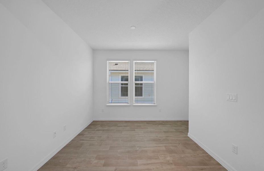 Spacious, unfurnished interior of a new home in Del Webb Wildlight, Yulee (Image 12).