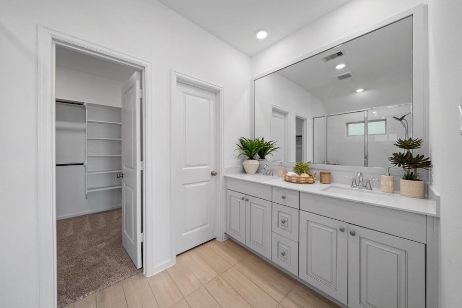 Start your day with plenty of space. The dual sinks make getting ready a breeze, no bumping elbows, no waiting your turn. It’s practical, comfortable, and perfect for busy routines. You’ll love how much storage this bathroom offers.