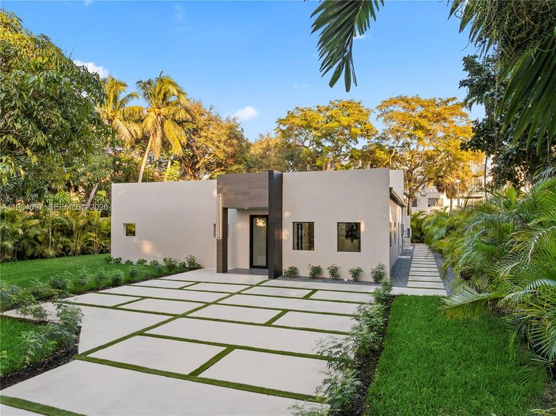 Front exterior of a new home in , North Miami, FL, highlighting curb appeal (Image 30).