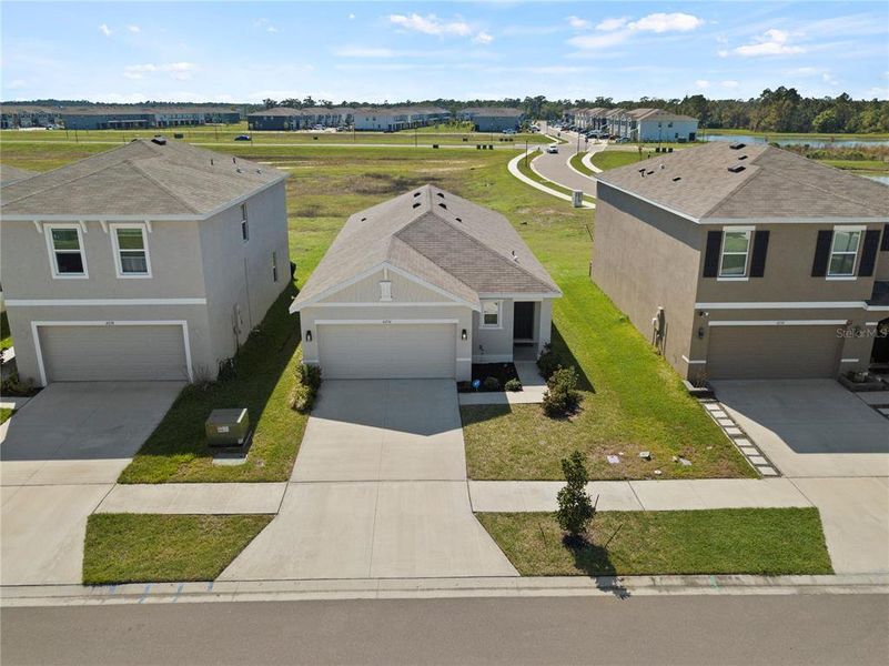 Front exterior of a new home in , Wesley Chapel, FL, highlighting curb appeal (Image 23). Front exterior of a new home in , Wesley Chapel, FL, highlighting curb appeal (Image 23).