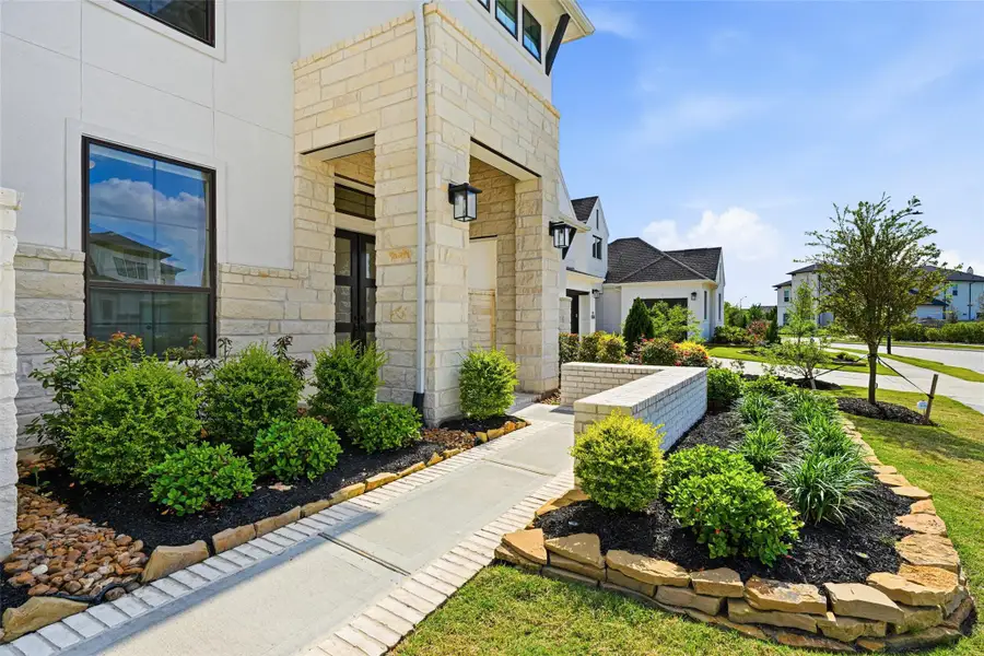 Exterior details and patio area of a home in , Cypress (Image 3).