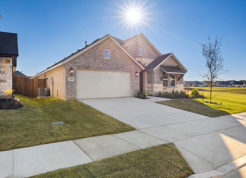 Front exterior of a new home in Elevon, Lavon, TX, highlighting curb appeal (Image 21).
