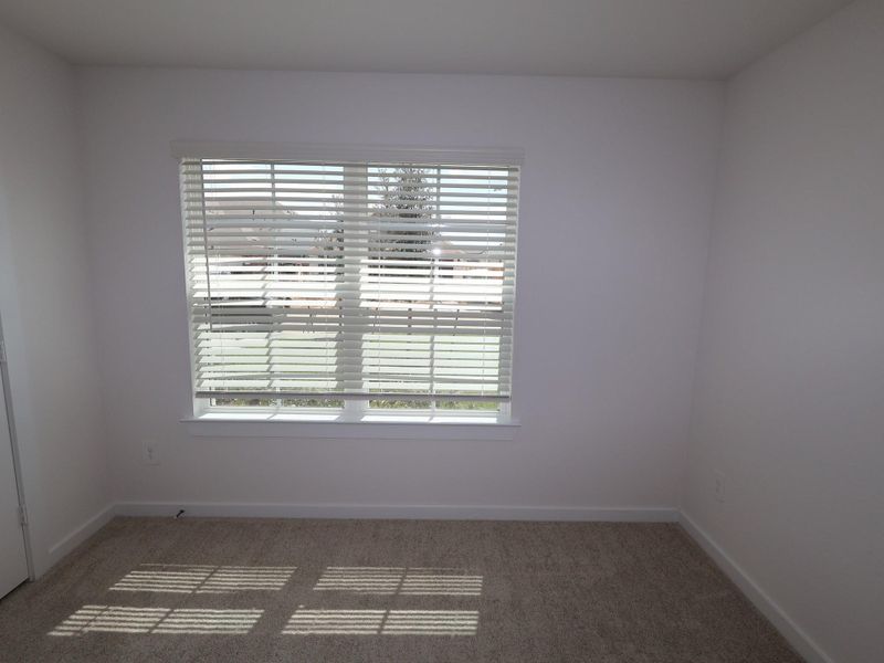 Spacious, unfurnished interior of a new home in Pinewood at Grand Texas, New Caney (Image 10).