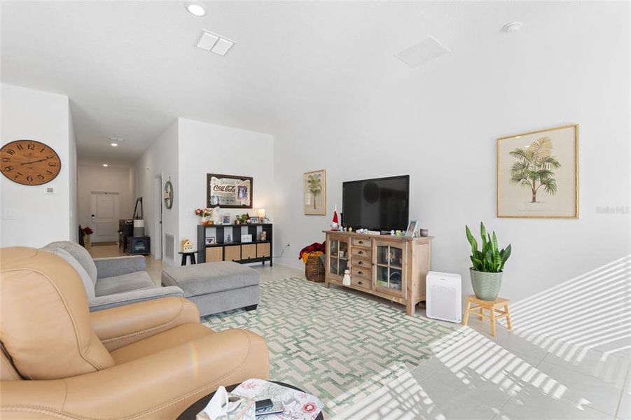 Furnished interior view inside a new home in Lawson Dunes: Estate Collection, Haines City (Image 6).