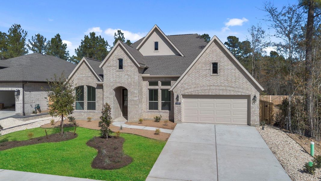 Front exterior of a new home in Colton, Montgomery, TX, highlighting curb appeal (Image 19). Front exterior of a new home in Colton, Montgomery, TX, highlighting curb appeal (Image 19).