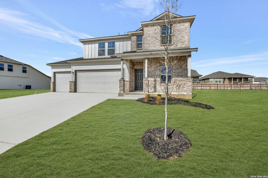 Front exterior of a new home in Greenspoint Heights, Seguin, TX, highlighting curb appeal (Image 27).