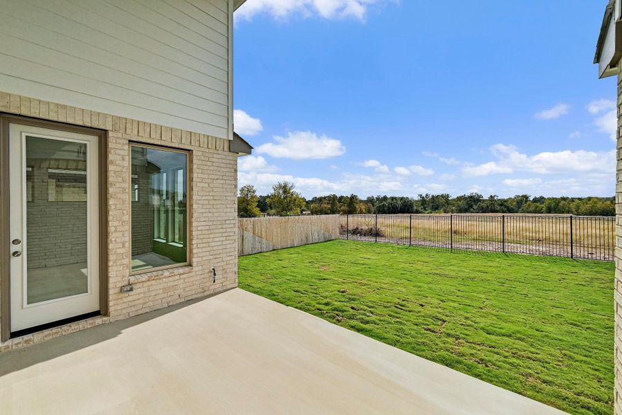 Exterior details and patio area of a home in Santa Rita Ranch - 60', Liberty Hill (Image 3). Exterior details and patio area of a home in Santa Rita Ranch - 60', Liberty Hill (Image 3).