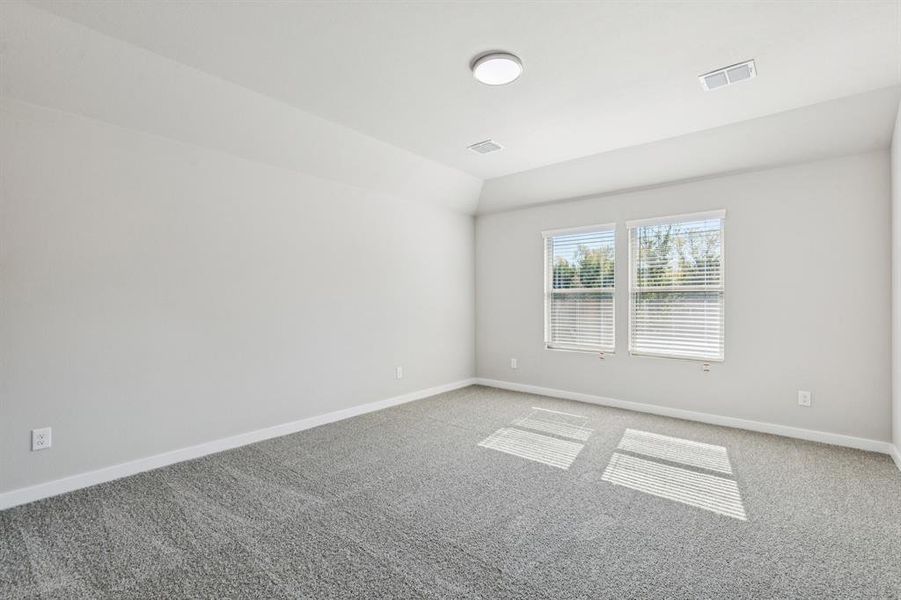 Primary Suite in the Heisman home plan by Trophy Signature Homes – REPRESENTATIVE PHOTO Primary Suite in the Heisman home plan by Trophy Signature Homes – REPRESENTATIVE PHOTO