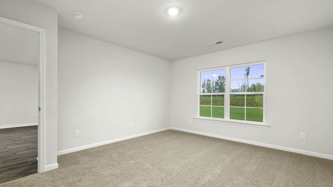 Representative unfurnished interior of a home built from the Manning by D.R. Horton in Chandler Pointe, Rural Hall (Image 14).