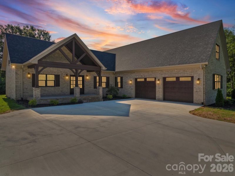 Front exterior of a new home in , Indian Trail, NC, highlighting curb appeal (Image 2). Front exterior of a new home in , Indian Trail, NC, highlighting curb appeal (Image 2).