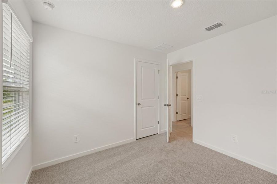 Spacious, unfurnished interior of a new home in Flagler Village - Classic Series, Palm Coast (Image 25). Spacious, unfurnished interior of a new home in Flagler Village - Classic Series, Palm Coast (Image 25).