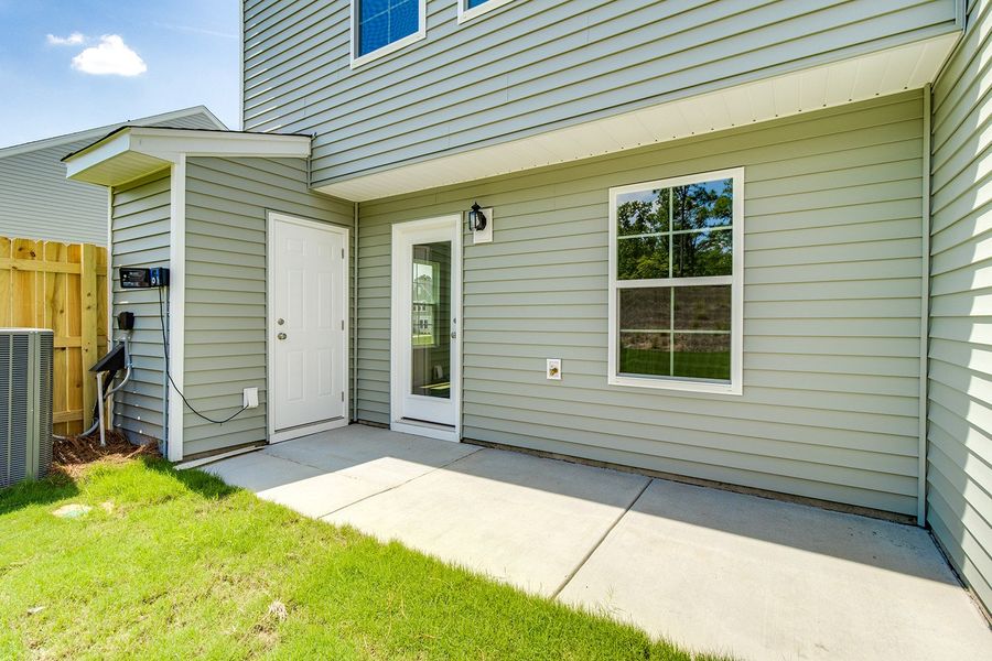 Exterior details and patio area of a home in Padgett Commons, Hopkins (Image 3). Exterior details and patio area of a home in Padgett Commons, Hopkins (Image 3).